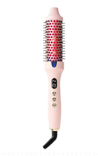 Cepillo térmico 3 en 1 rosa con luz roja encendida